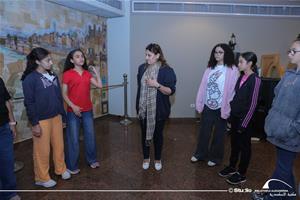 M<sup>me</sup> Marguerite avec les participants de l'atelier de th&eacute;&acirc;tre